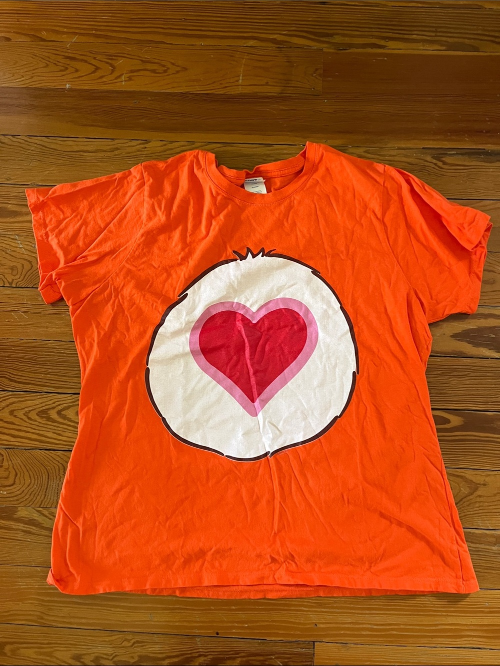 Women’s Care Bear Tenderheart Graphic Tee worn once Halloween